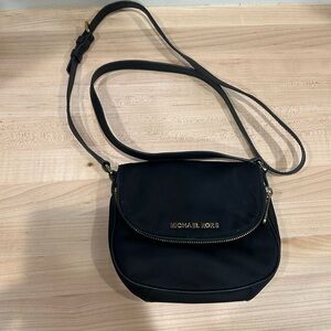 michael kors bedford black flap zipper nylon and leather crossbody bag.